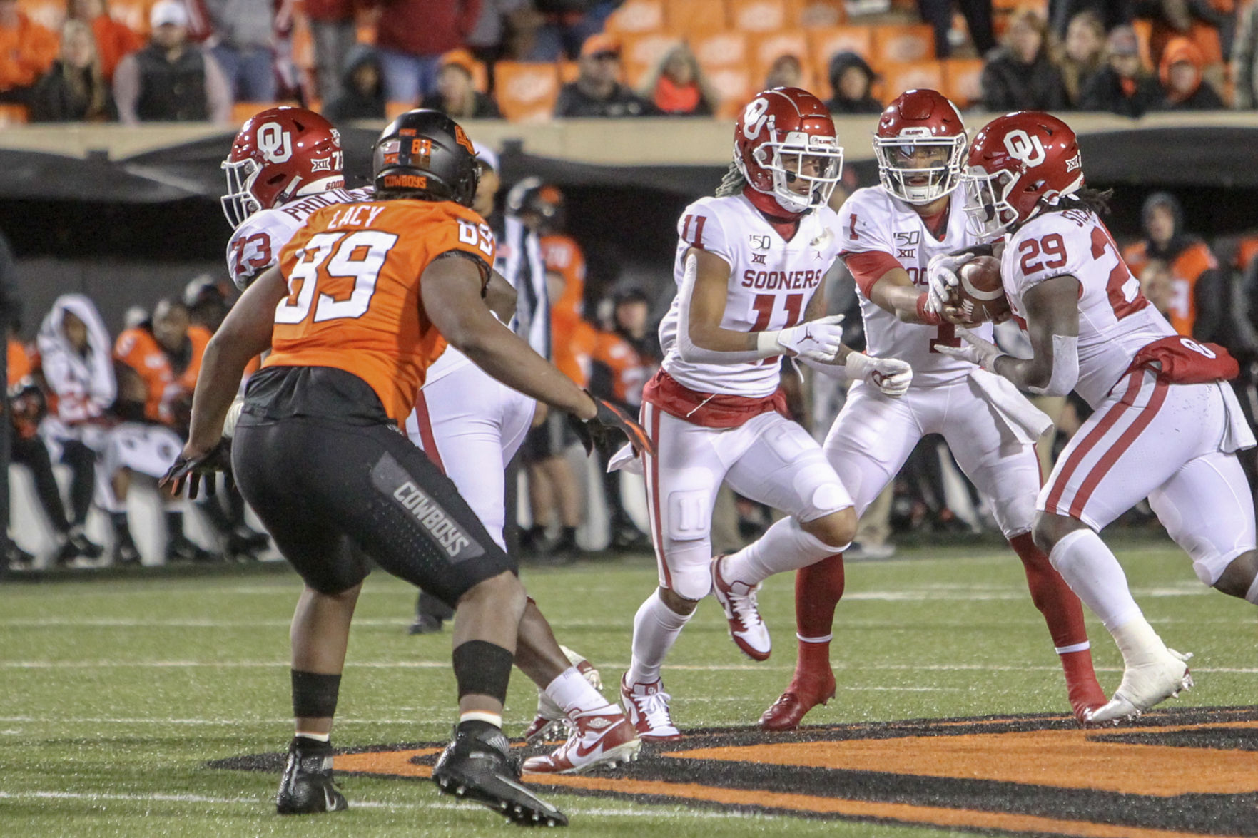 Jalen Hurts handoff to Rhamondre Stevenson